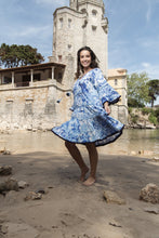Load image into Gallery viewer, Orientique Okayama printed open neck tassel and tiered organic cotton dress displayed on a model, featuring a bohemian style.