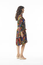 Load image into Gallery viewer, Orientique Torgua boho dress with printed V-neck, detailed trim, tassels, and crepe woven fabric, perfect for casual wear.