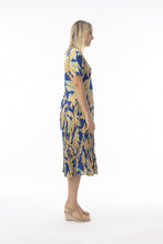 Load image into Gallery viewer, Orientique Playa Brava print crinkle short sleeve godet midi dress, vibrant floral design, flowy lightweight fabric, casual summer style