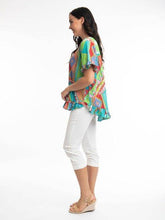 Load image into Gallery viewer, Orientique Zio Turquoise organic cotton woven top with frill trim and long sleeves, showcasing a stylish, comfortable design.