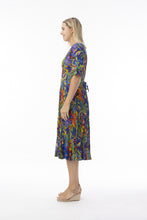 Load image into Gallery viewer, Orientique Zapallar print crinkle short sleeve godet midi dress, showcasing colorful patterned fabric and flowing design.