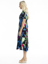 Load image into Gallery viewer, Orientique Seychelles print crinkle short sleeve godet midi dress, colorful floral pattern, lightweight fabric, flowing silhouette.