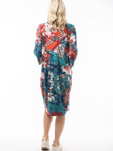 Load image into Gallery viewer, Orientique Apollo blue and red cotton jersey bubble dress with 3/4 sleeves, panel design, viewed from the back.