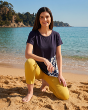 Load image into Gallery viewer, Foil Signature 7/8 plain coloured pull-on trousers in kiwi green, displayed on a model in a well-lit studio setting.