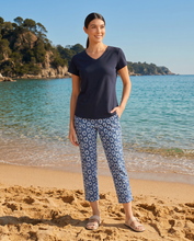 Load image into Gallery viewer, Foil brand navy pull-on trousers with foil signature printed design, displayed in a well-lit photography setting.