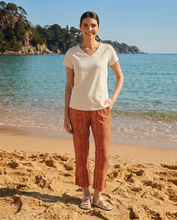 Load image into Gallery viewer, Foil signature printed 7/8 pull-on trousers in Marrakesh burnt orange, featuring a stylish and comfortable fit.