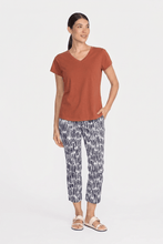 Load image into Gallery viewer, Foil signature printed Capri 7/8 stretch trapeze trousers with a fuss-free design, showcasing vibrant geometric print and comfortable fit.