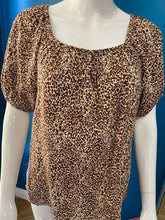 Load image into Gallery viewer, Black BYoung Joella short sleeve gypsy style blouse with front tie detail, featuring a relaxed, bohemian-inspired design.
