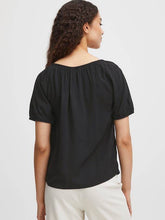 Load image into Gallery viewer, Black BYoung Joella short sleeve gypsy style blouse with front tie detail, showcasing a relaxed boho-inspired design.