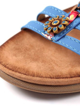 Load image into Gallery viewer, Blue Lunar Feast ribbon and floral trim T-bar open toe sandals with elasticated back, showcasing stylish summer footwear.