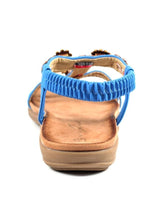 Load image into Gallery viewer, Lunar Feast open toe T-bar sandals with floral ribbon trim and elasticated back in blue, stylish and comfortable footwear.