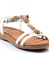 Load image into Gallery viewer, Lunar Feast open toe T-bar sandals with floral ribbon trim, elasticated back, in blue, stylish and comfortable for warm weather.