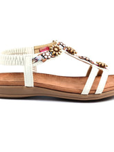 Load image into Gallery viewer, Lunar Feast white T-bar open toe sandal with floral ribbon trim and elasticated back, stylish and comfortable for warm weather.