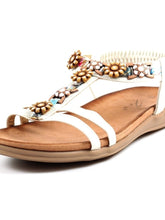Load image into Gallery viewer, Lunar Feast white T-bar open toe sandals with floral ribbon trim and elasticated back, stylish and comfortable footwear.