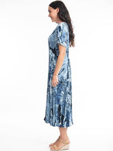 Load image into Gallery viewer, Orientique Agios blue palm print crinkle short sleeve midi dress with godet panels, perfect for casual or summer wear.