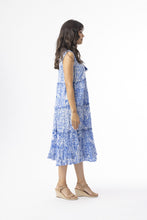 Load image into Gallery viewer, Blue Orientique Aksharay boho dress with sleeveless design, tassels, tiered organic cotton, printed, perfect for casual summer wear.
