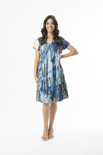 Load image into Gallery viewer, Orientique Tower Blue printed organic cotton crinkle woven dress, easy fit with a stylish design, perfect for casual wear.
