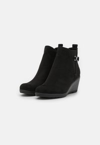 Marco Tozzi Black Microfibre Wedge Ankle Boot With Side Trim - Boutique on the Green 