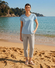 Load image into Gallery viewer, Foil Signature 7/8 plain coloured pull-on trousers in Moon Rock Beige, showcasing comfortable, slim-fit design and smooth fabric.
