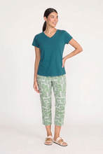 Load image into Gallery viewer, Foil Signature Fuss Free Printed Capri 7/8 stretch trapeze trousers with lush leaves print, featuring a relaxed fit and vibrant leaf design.
