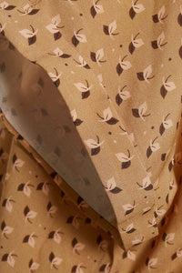 Saint Tropez tan leaf print cap sleeve woven top